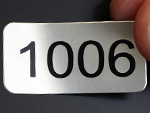 Metal tags with consecutive numbers