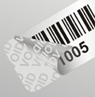 Roll of tamperproof consecutive barcodes with void