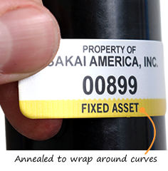Conformable metal asset tags with numbers