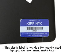 Plastic laptop label for a laptop shows wear and tear